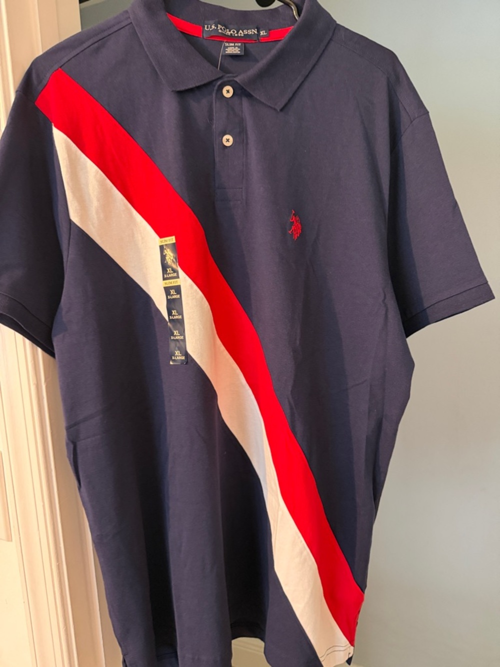 U.S. Polo Assn. Navy Polo with Red and White Diagonal Stripes